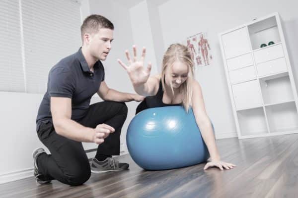 exercise physiologist with patient